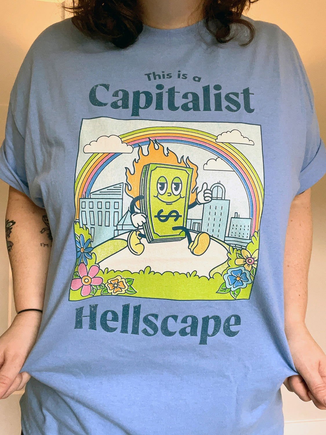 This is a Capitalist Hellscape Short - Sleeve Tee - Creepy Orca Supply Co