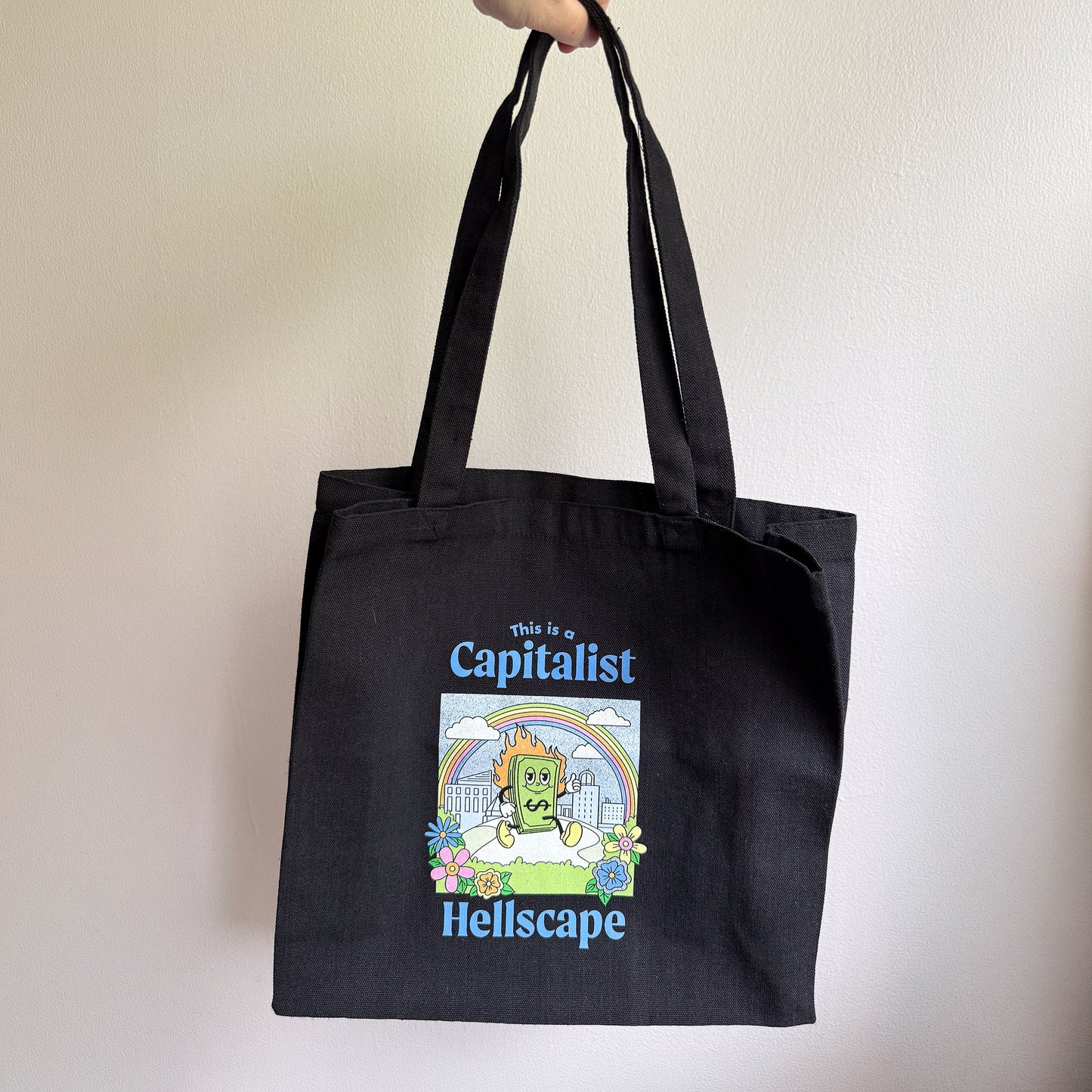 This is a Capitalist Hellscape Tote Bag